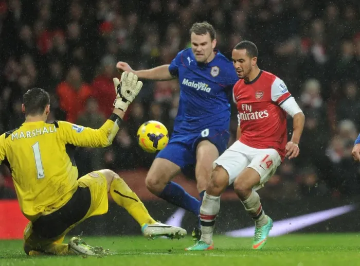 Framed Print : Theo Walcott Scores Chip Over David Marshall: Arsenal vs. Cardiff City, Premier League 2013-14