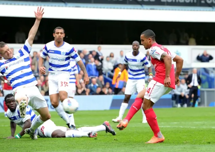 Framed Print : Theo Walcott Scores Dramatic Goal Past Clint Hill in Queens Park Rangers vs. Arsenal (2011-12) Framed Print : Theo Walcott Scores Dramatic Goal Past Clint Hill in Queens Park Rangers vs. Arsenal (2011-12)