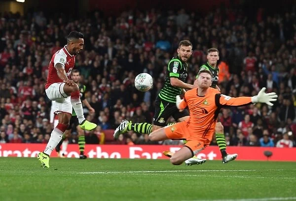 Theo Walcott Scores Against Ian Lawlor: Arsenal's Goal in Carabao Cup Triumph over Doncaster Rovers