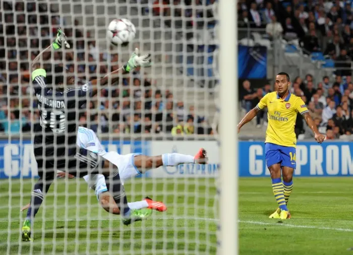 Framed Print : Theo Walcott Scores Against Mandanda: Arsenal vs. Olympique de Marseille, UEFA Champions League (2013) Framed Print : Theo Walcott Scores Against Mandanda: Arsenal vs. Olympique de Marseille, UEFA Champions League (2013)