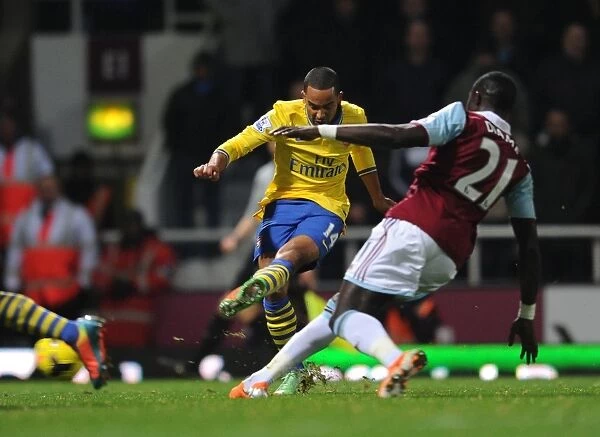 Theo Walcott Scores Against Mohamed Diame: A Pivotal Moment in the 2013-14 West Ham United vs. Arsenal Premier League Clash