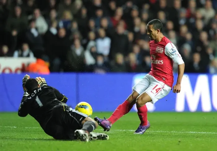 Framed Print : Theo Walcott Scores Past Michel Vorm: Swansea City vs. Arsenal, Premier League 2011-12 Framed Print : Theo Walcott Scores Past Michel Vorm: Swansea City vs. Arsenal, Premier League 2011-12