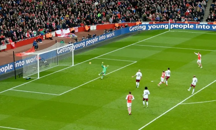 Framed Print : Theo Walcott Scores Thrilling Goal Against Aston Villa in Premier League Framed Print : Theo Walcott Scores Thrilling Goal Against Aston Villa in Premier League