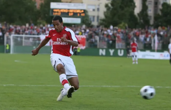 Framed Print : Theo Walcott shoots past Daniel Rozsa to score the Arsenal goal Framed Print : Theo Walcott shoots past Daniel Rozsa to score the Arsenal goal