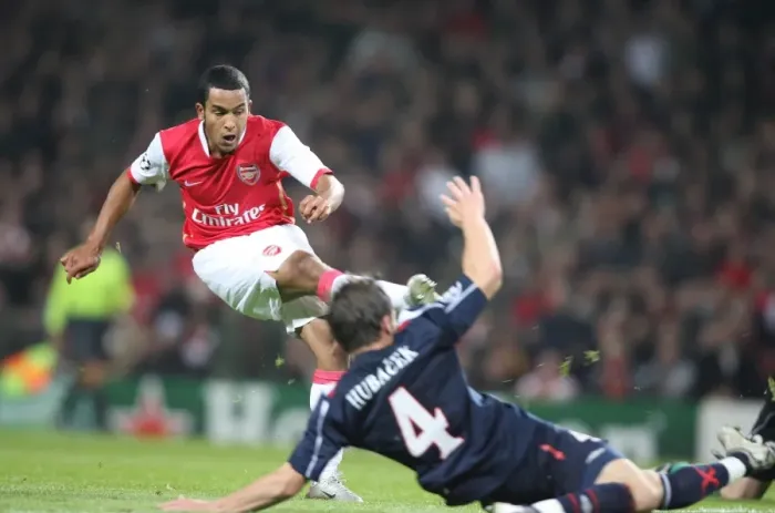 Framed Print : Theo Walcott shoots past David Hubacek (Slavia) to score Arsenals 3rd goal his 1st