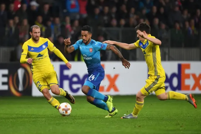 Framed Print : Theo Walcott Stands Firm Against Stasevich and Dragun: Arsenal's Europa League Showdown vs. FC BATE Borisov Framed Print : Theo Walcott Stands Firm Against Stasevich and Dragun: Arsenal's Europa League Showdown vs. FC BATE Borisov