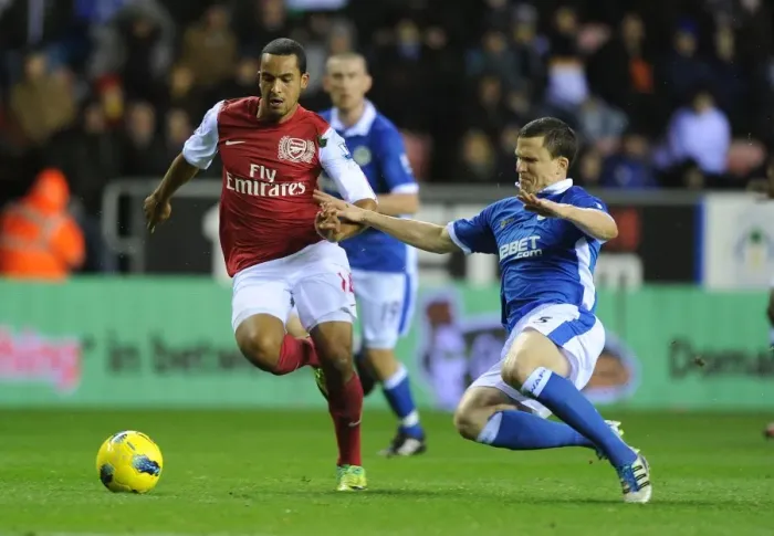 Framed Print : Theo Walcott Surges Past Gary Caldwell: Wigan Athletic vs. Arsenal, Premier League 2011-12