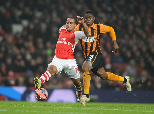 Theo Walcott Surges Past Hull's Maynor Figeroa in FA Cup Third Round Clash at Arsenal's Emirates Stadium