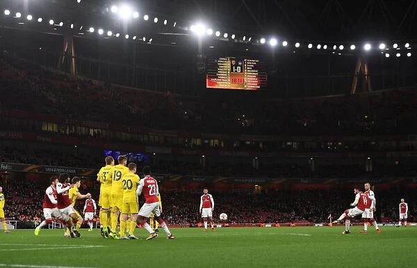 Theo Walcott Takes a Free Kick for Arsenal against BATE Borisov in the Europa League