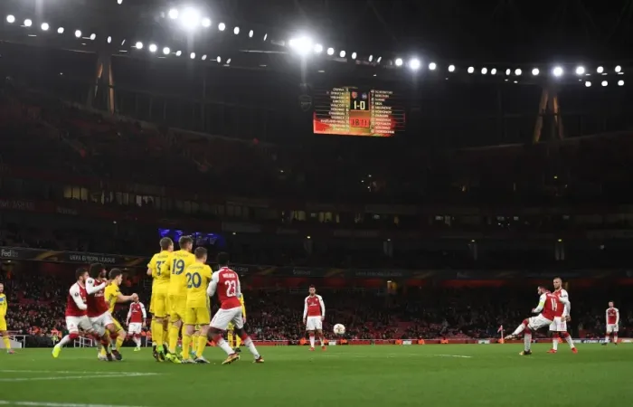 Framed Print : Theo Walcott Takes a Free Kick for Arsenal against BATE Borisov in the Europa League