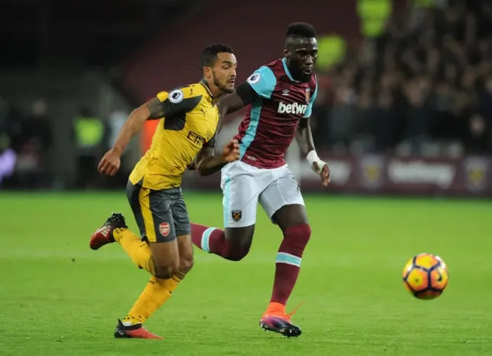 Framed Print : Theo Walcott vs. Arthur Masuaku: Battle at London Stadium - West Ham United vs. Arsenal (Premier League, 2016-17) Framed Print : Theo Walcott vs. Arthur Masuaku: Battle at London Stadium - West Ham United vs. Arsenal (Premier League, 2016-17)