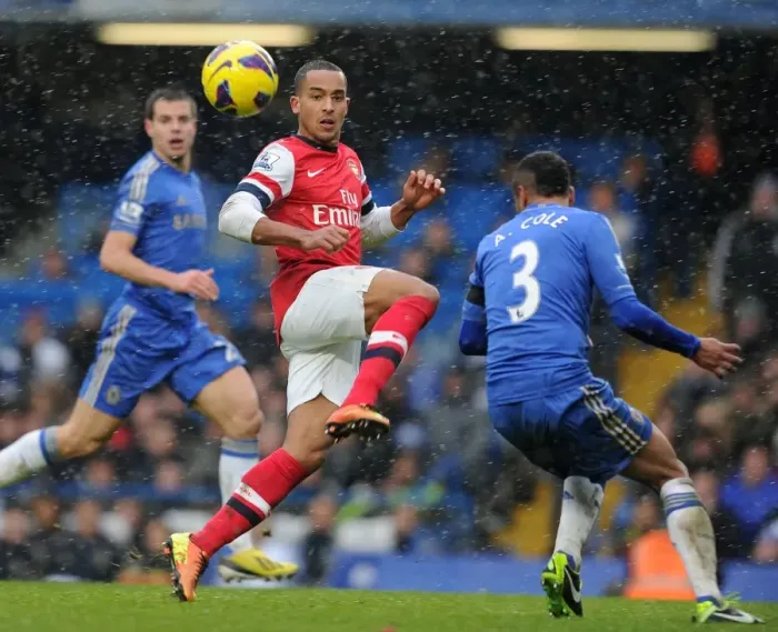Framed Print : Theo Walcott vs. Ashley Cole: Intense Battle at Stamford Bridge (Chelsea v Arsenal, Premier League 2012-13)