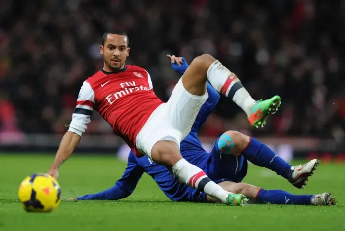 Framed Print : Theo Walcott vs Bo-Kyung Kim: A Battle at the Emirates - Arsenal vs Cardiff City, Premier League Framed Print : Theo Walcott vs Bo-Kyung Kim: A Battle at the Emirates - Arsenal vs Cardiff City, Premier League