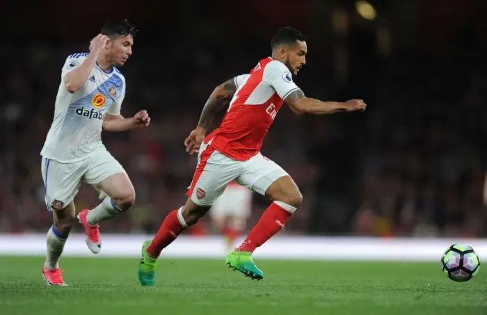 Framed Print : Theo Walcott vs. Bryan Oviedo: A Battle at the Emirates - Arsenal v Sunderland, Premier League 2016-17