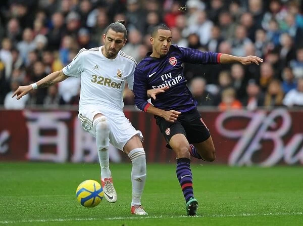 Theo Walcott vs Chico Flores: Intense Battle in Swansea v Arsenal FA Cup Match