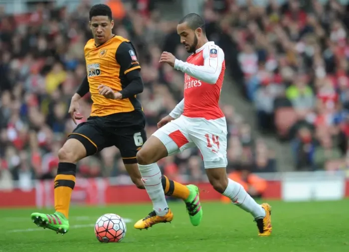 Framed Print : Theo Walcott vs. Curtis Davies: A FA Cup Fifth Round Showdown at Arsenal's Emirates Stadium Framed Print : Theo Walcott vs. Curtis Davies: A FA Cup Fifth Round Showdown at Arsenal's Emirates Stadium