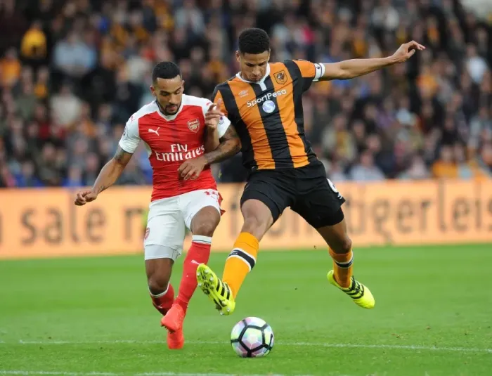 Framed Print : Theo Walcott vs. Curtis Davies: A Footballing Battle in the Hull City vs. Arsenal Premier League Clash (September 2016) Framed Print : Theo Walcott vs. Curtis Davies: A Footballing Battle in the Hull City vs. Arsenal Premier League Clash (September 2016)
