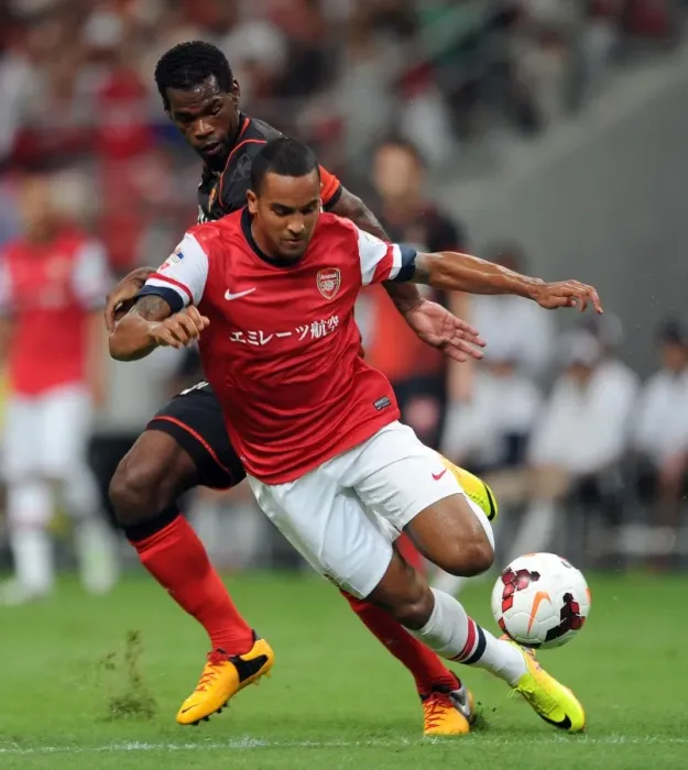Framed Print : Theo Walcott vs Danilson: Clash in the 2013-14 Nagoya Grampus vs Arsenal Match Framed Print : Theo Walcott vs Danilson: Clash in the 2013-14 Nagoya Grampus vs Arsenal Match