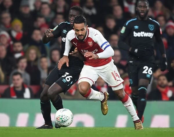 Theo Walcott vs. Domingos Quina: A Battle in the Carabao Cup Quarterfinal Between Arsenal and West Ham United