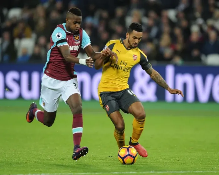 Framed Print : Theo Walcott vs. Edimilson Fernandes: A Battle in the Premier League Clash Between West Ham and Arsenal (December 2016) Framed Print : Theo Walcott vs. Edimilson Fernandes: A Battle in the Premier League Clash Between West Ham and Arsenal (December 2016)
