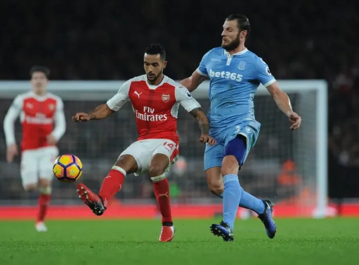 Framed Print : Theo Walcott vs Erik Pieters: Intense Battle at Arsenal's Emirates Stadium (Arsenal v Stoke City 2016-17) Framed Print : Theo Walcott vs Erik Pieters: Intense Battle at Arsenal's Emirates Stadium (Arsenal v Stoke City 2016-17)