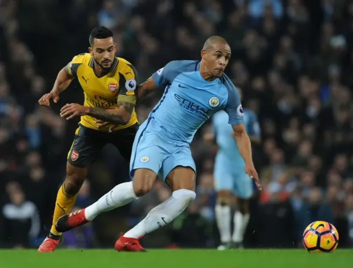 Framed Print : Theo Walcott vs. Fernando: Clash at the Etihad - Manchester City vs. Arsenal, Premier League 2016-17