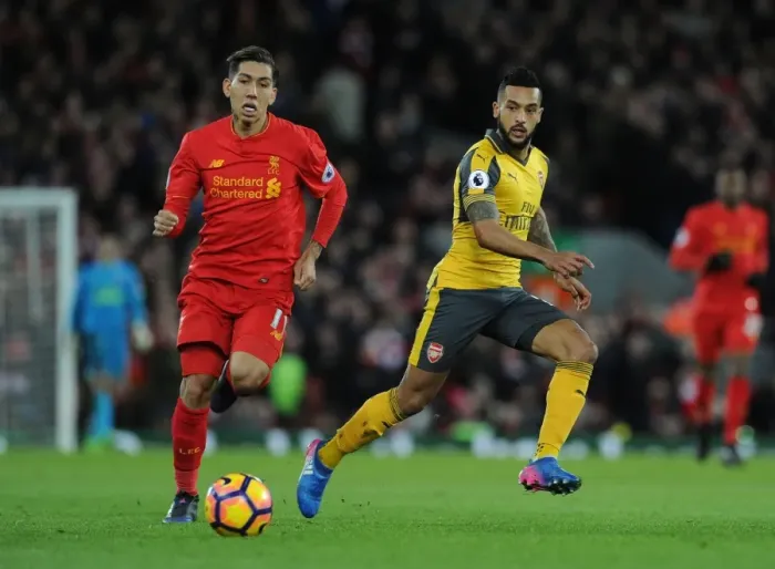 Framed Print : Theo Walcott vs. Firmino: Intense Battle at Anfield - Liverpool vs. Arsenal, Premier League 2016-17