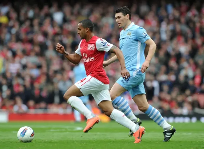 Framed Print : Theo Walcott vs. Gareth Barry: Clash of Premier League Titans (Arsenal v Manchester City, 2011-12)