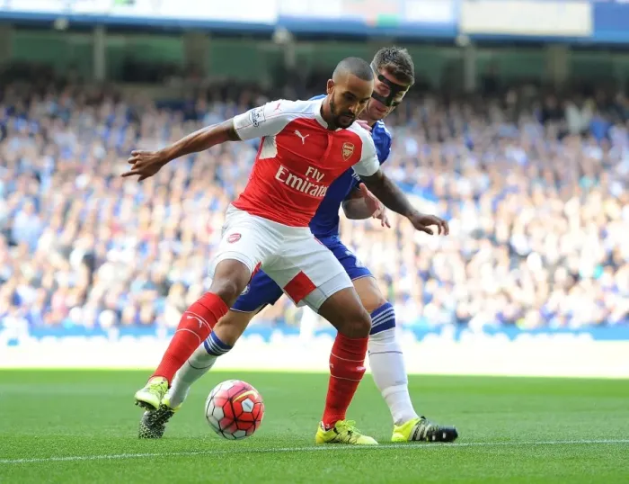Framed Print : Theo Walcott vs. Gary Cahill: A Premier League Battle at the Heart of Chelsea vs. Arsenal (2015-16)