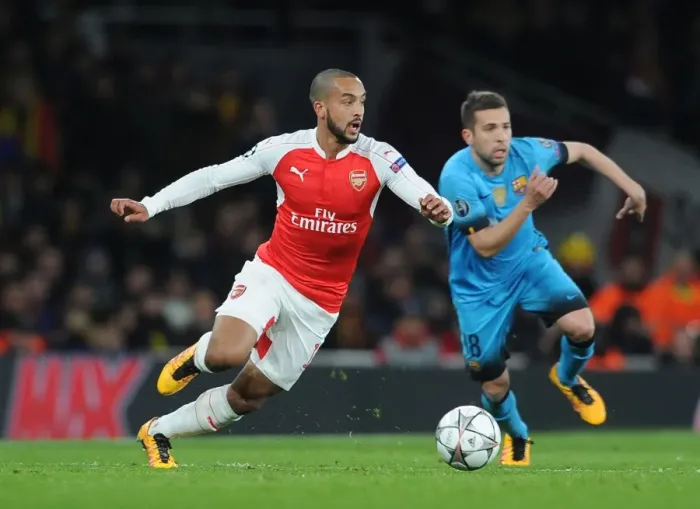 Framed Print : Theo Walcott vs. Jordi Alba: A Battle of Wings in Arsenal vs. Barcelona Champions League Clash (2015 / 16)