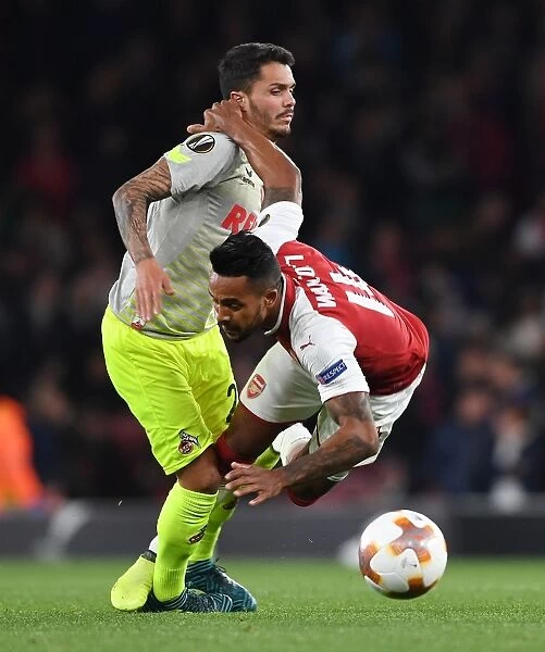 Theo Walcott vs. Leonardo Bittencourt: Intense Clash in Arsenal v FC Köln UEFA Europa League Match