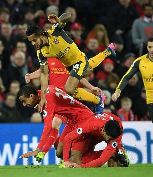 Theo Walcott vs. Liverpool's Defense: Intense Battle at Anfield (Liverpool v Arsenal, Premier League 2016-17)