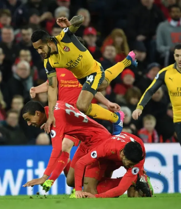 Framed Print : Theo Walcott vs. Liverpool's Defense: Intense Battle at Anfield (Liverpool v Arsenal, Premier League 2016-17) Framed Print : Theo Walcott vs. Liverpool's Defense: Intense Battle at Anfield (Liverpool v Arsenal, Premier League 2016-17)