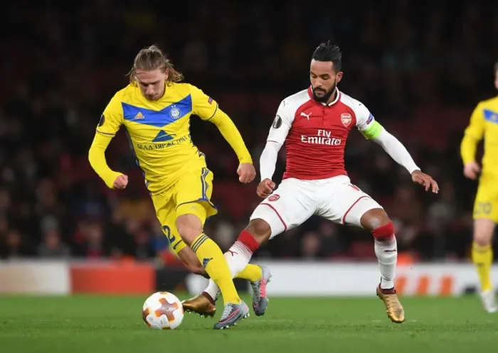 Framed Print : Theo Walcott vs Maksim Volodko: Arsenal FC vs BATE Borisov, UEFA Europa League Clash