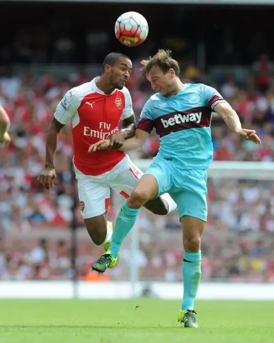Framed Print : Theo Walcott vs Mark Noble: A Premier League Showdown