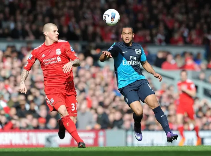 Framed Print : Theo Walcott vs Martin Skrtel: Intense Battle at Anfield (Liverpool v Arsenal, Premier League, 2011-12) Framed Print : Theo Walcott vs Martin Skrtel: Intense Battle at Anfield (Liverpool v Arsenal, Premier League, 2011-12)