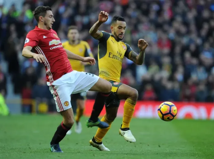 Framed Print : Theo Walcott vs. Matteo Darmian: Battle at Old Trafford - Manchester United vs. Arsenal, Premier League 2016-17 Framed Print : Theo Walcott vs. Matteo Darmian: Battle at Old Trafford - Manchester United vs. Arsenal, Premier League 2016-17