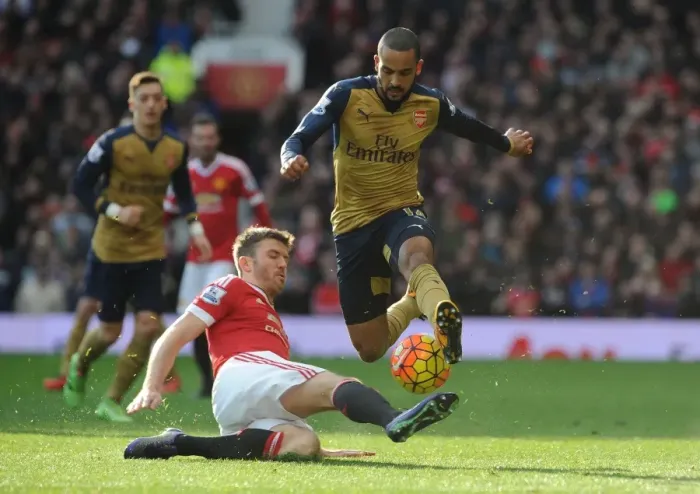 Framed Print : Theo Walcott vs Michael Carrick: A Premier League Showdown at Old Trafford (Manchester United vs Arsenal, 2015 / 16)