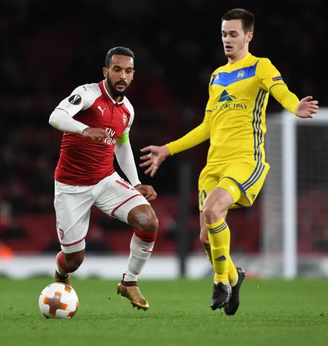Framed Print : Theo Walcott vs. Mirko Ivanic: Arsenal FC vs. BATE Borisov, UEFA Europa League Clash