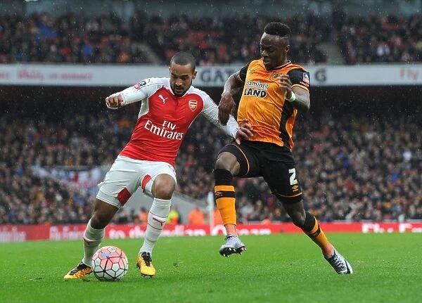 Theo Walcott vs. Moses Odubajo: A Battle at The Emirates - Arsenal vs. Hull City FA Cup Clash