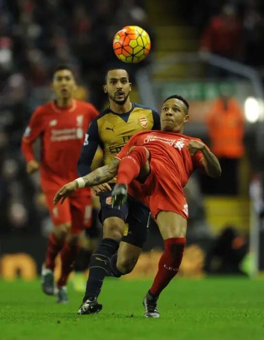 Framed Print : Theo Walcott vs Nathaniel Clyne: Intense Rivalry at Anfield (Premier League 2015-16)