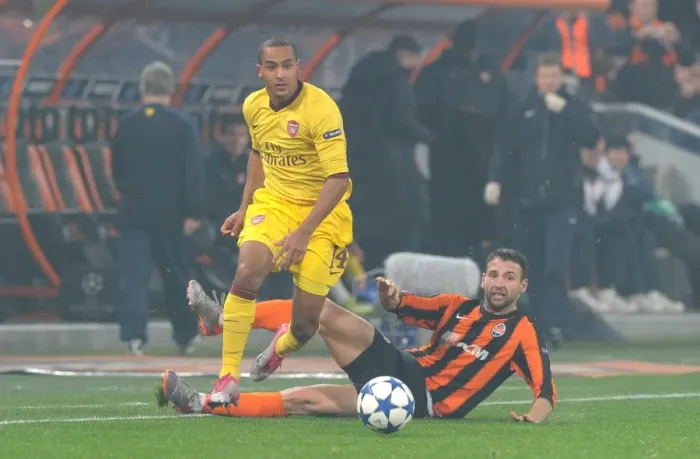 Framed Print : Theo Walcott vs. Razvan Rat: Arsenal's Close Call Against Shakhtar Donetsk in the UEFA Champions League (3 / 11 / 2010)