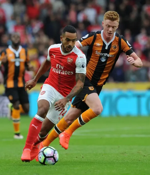 Framed Print : Theo Walcott vs. Sam Clucas: A Premier League Battle at KCOM Stadium Framed Print : Theo Walcott vs. Sam Clucas: A Premier League Battle at KCOM Stadium