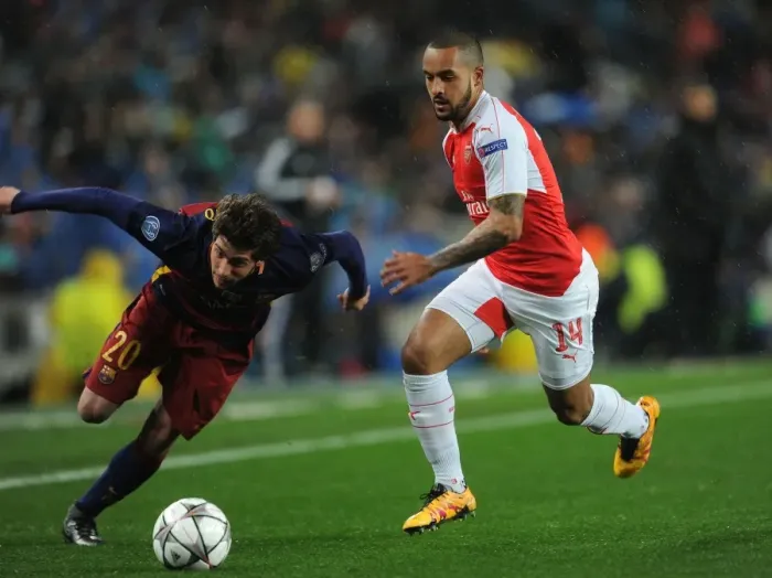 Framed Print : Theo Walcott vs. Sergi Roberto: A Battle in the UEFA Champions League