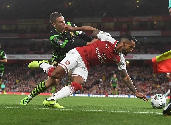 Theo Walcott vs. Tommy Rowe: Arsenal vs. Doncaster Rovers in Carabao Cup Clash