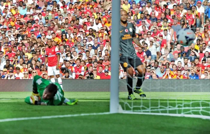 Framed Print : Theo Walcott watches his cross go in for Arsenals goal. Arsenal 1: 2 Galatasaray Framed Print : Theo Walcott watches his cross go in for Arsenals goal. Arsenal 1: 2 Galatasaray