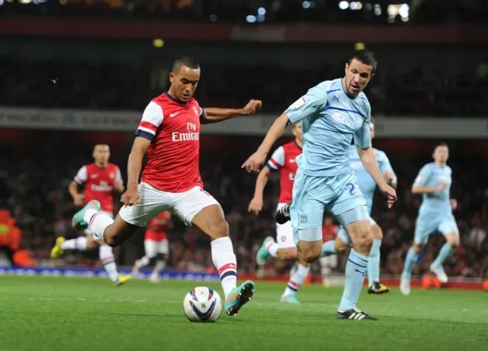 Framed Print : Theo Walcott's Brace: Arsenal Cruise Past Coventry City in Capital One Cup
