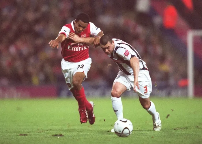 Framed Print : Theo Walcott's Brace: Arsenal Cruise Past West Brom in Carling League Cup