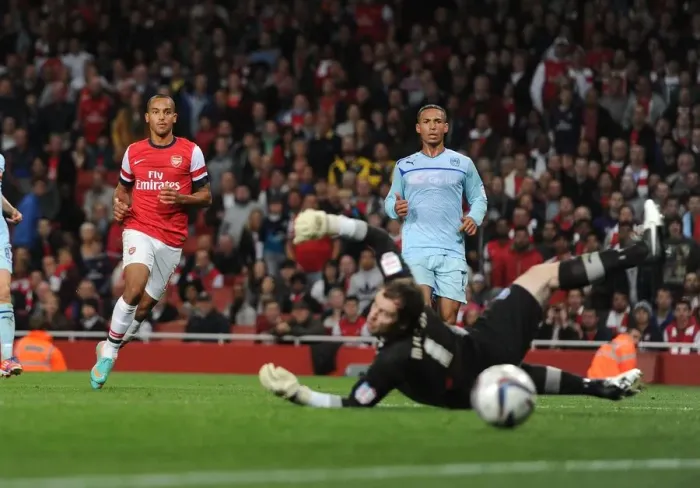 Framed Print : Theo Walcott's Brace: Arsenal's Thrashing of Coventry City in Capital One Cup
