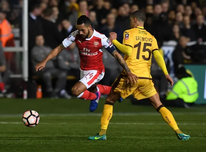 Framed Print : Theo Walcott's Breakthrough: Sutton United vs. Arsenal in the FA Cup Fifth Round